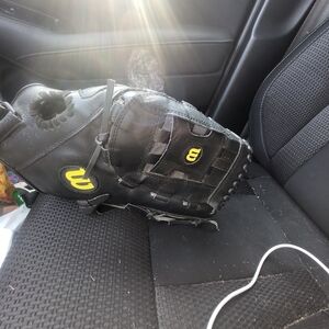 Wilson Black Youth Baseball Glove with Yellow Logo